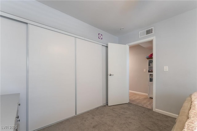1407 Dorothy Ave Unit 2, Las Vegas, NV 89119 - unfurnished bedroom with a closet and carpet