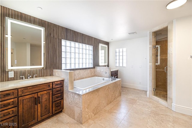 1319 Red Baron Ln, Boulder City, NV 89005 - bathroom with vanity, a bath, a shower stall, and tile patterned floors