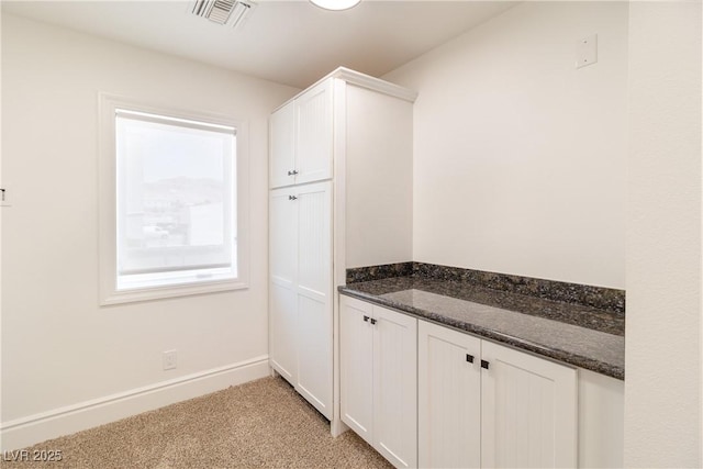 1319 Red Baron Ln, Boulder City, NV 89005 - laundry room featuring light colored carpet and baseboards