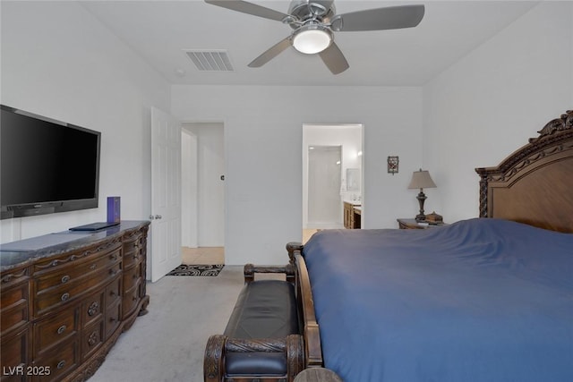 10181 Mount Harlow Ct, Las Vegas, NV 89141 - bedroom with light colored carpet, ceiling fan, and ensuite bathroom