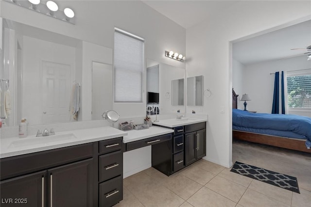 10181 Mount Harlow Ct, Las Vegas, NV 89141 - ensuite bathroom featuring vanity and tile patterned flooring