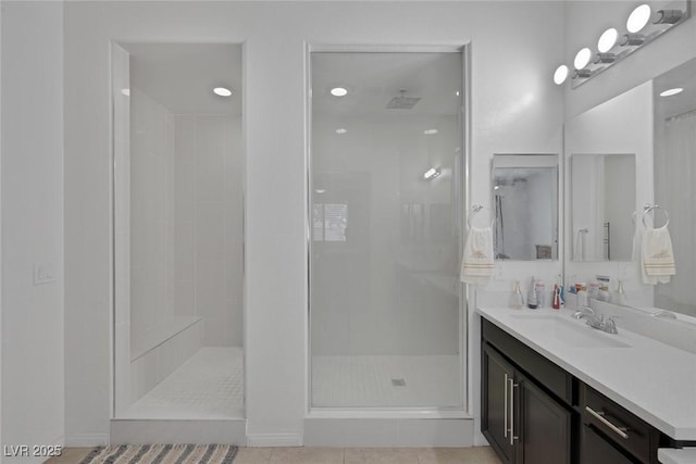 10181 Mount Harlow Ct, Las Vegas, NV 89141 - full bathroom with a shower stall, vanity, tile patterned floors, and recessed lighting