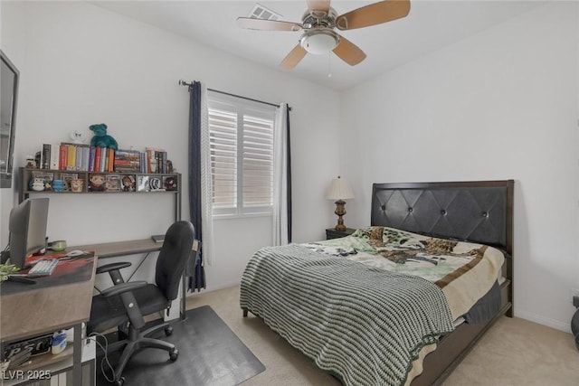 10181 Mount Harlow Ct, Las Vegas, NV 89141 - bedroom with light colored carpet, an office area, and ceiling fan