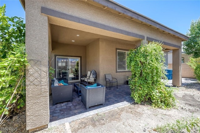 10181 Mount Harlow Ct, Las Vegas, NV 89141 - view of patio featuring outdoor lounge area