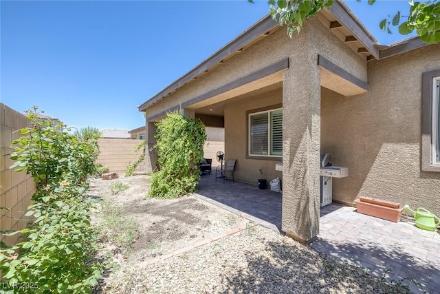 10181 Mount Harlow Ct, Las Vegas, NV 89141 - fenced backyard with a patio area