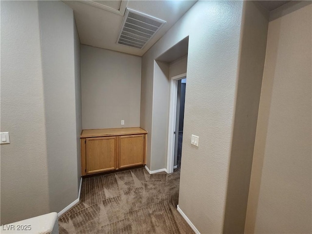 10231 Deerfield Beach Ave Unit 104, Las Vegas, NV 89129 - corridor featuring carpet flooring and baseboards