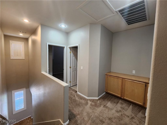 10231 Deerfield Beach Ave Unit 104, Las Vegas, NV 89129 - hallway with carpet flooring and recessed lighting