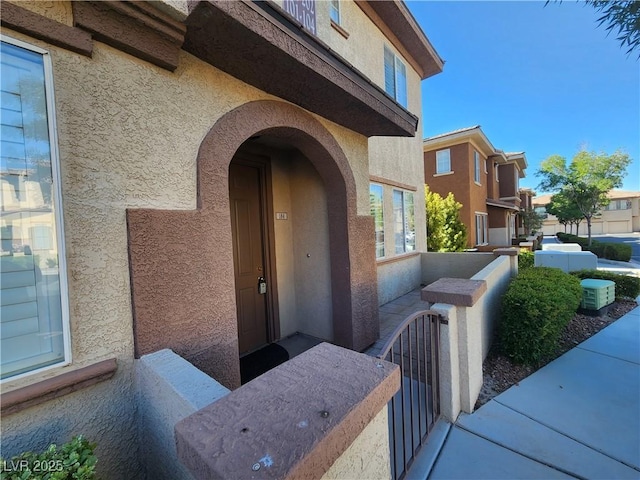 10231 Deerfield Beach Ave Unit 104, Las Vegas, NV 89129 - entrance to property featuring stucco siding