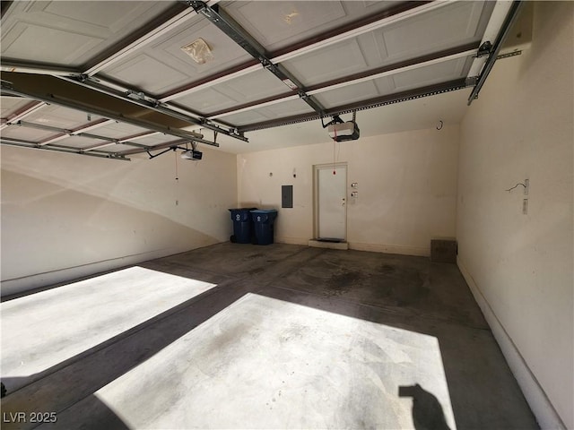 10231 Deerfield Beach Ave Unit 104, Las Vegas, NV 89129 - garage with a garage door opener