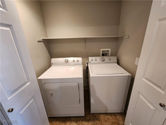 10231 Deerfield Beach Ave Unit 104, Las Vegas, NV 89129 - washroom with washer and dryer