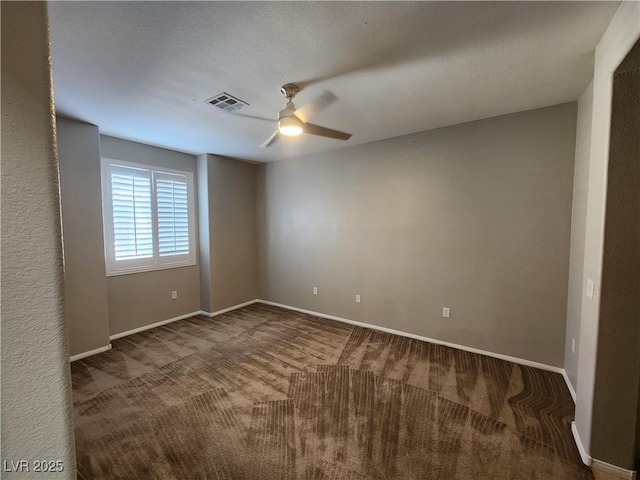 10231 Deerfield Beach Ave Unit 104, Las Vegas, NV 89129 - spare room featuring ceiling fan and carpet
