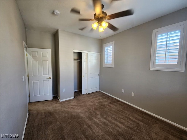 10231 Deerfield Beach Ave Unit 104, Las Vegas, NV 89129 - unfurnished bedroom featuring dark colored carpet, a closet, and a ceiling fan