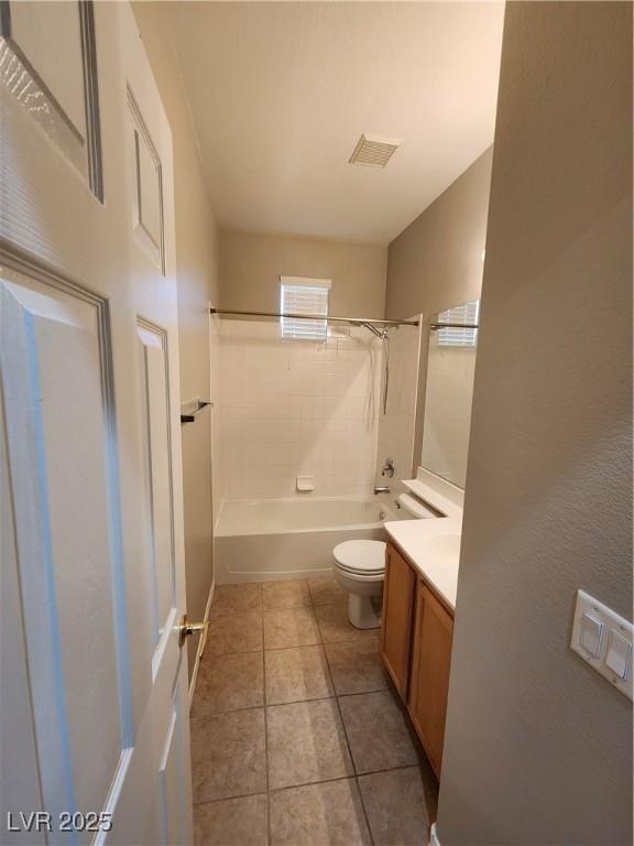 10231 Deerfield Beach Ave Unit 104, Las Vegas, NV 89129 - bathroom with vanity, shower / washtub combination, and tile patterned flooring