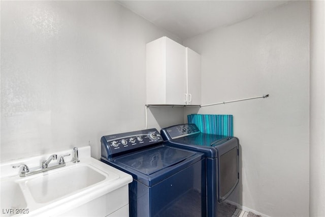 7135 Polaris Ave, Las Vegas, NV 89118 - laundry area with separate washer and dryer and cabinet space