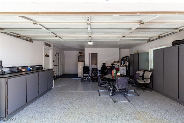 7135 Polaris Ave, Las Vegas, NV 89118 - garage with a garage door opener