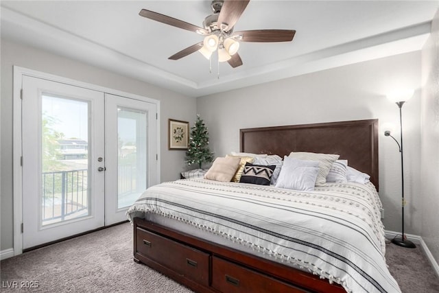 7135 Polaris Ave, Las Vegas, NV 89118 - bedroom featuring light carpet, french doors, access to outside, and multiple windows