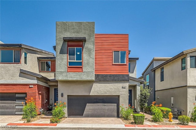 3194 Lumassina Way, Henderson, NV 89044 - modern home with a garage and stucco siding