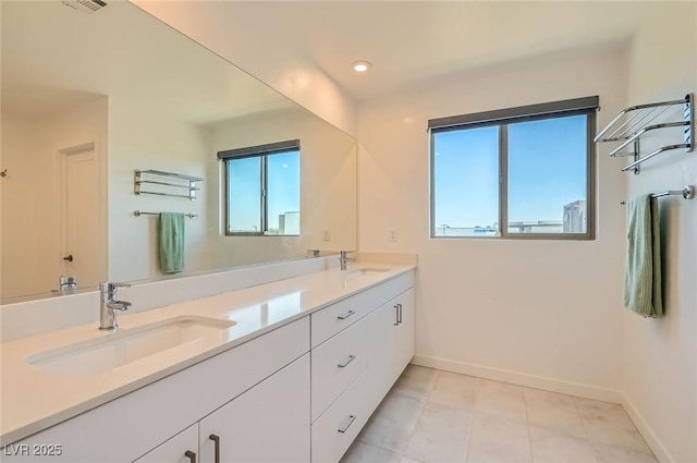 3194 Lumassina Way, Henderson, NV 89044 - full bathroom with plenty of natural light, double vanity, and recessed lighting