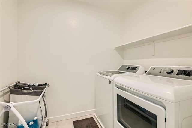 3194 Lumassina Way, Henderson, NV 89044 - laundry room featuring washer and dryer and light tile patterned floors