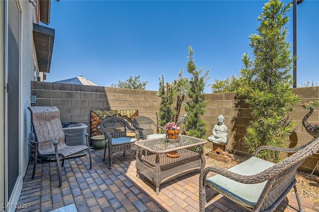 3194 Lumassina Way, Henderson, NV 89044 - fenced backyard with a patio