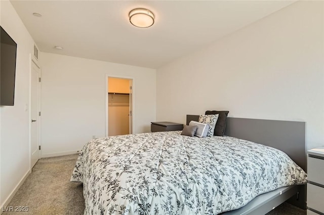 3194 Lumassina Way, Henderson, NV 89044 - bedroom featuring light carpet, a spacious closet, and a closet