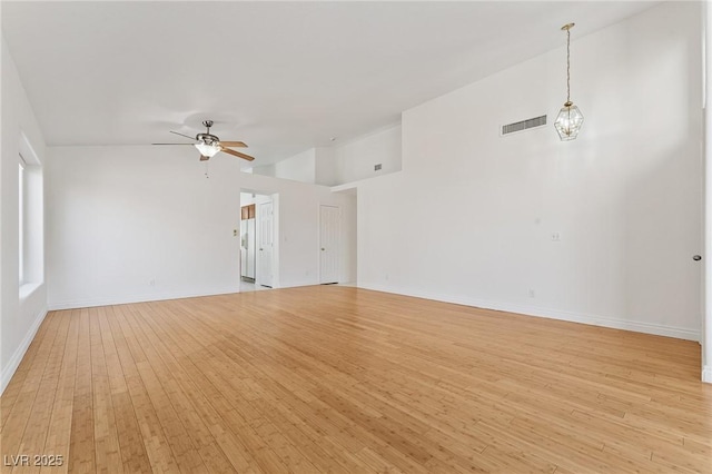 1908 Summit Pointe Dr, Las Vegas, NV 89117 - spare room with a ceiling fan, light wood-style floors, and lofted ceiling