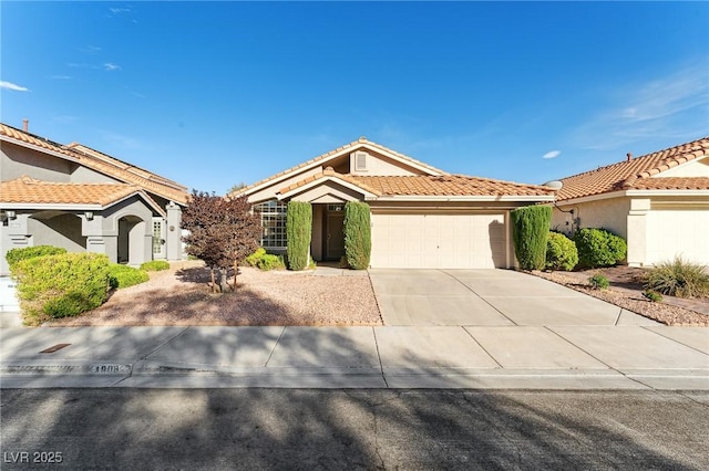 1908 Summit Pointe Dr, Las Vegas, NV 89117 - ranch-style house featuring an attached garage, driveway, stucco siding, and a tile roof