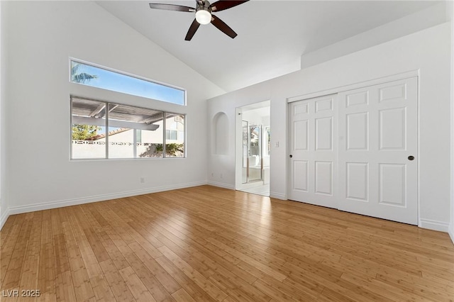 1908 Summit Pointe Dr, Las Vegas, NV 89117 - unfurnished bedroom featuring high vaulted ceiling, light wood-type flooring, a closet, a ceiling fan, and ensuite bathroom