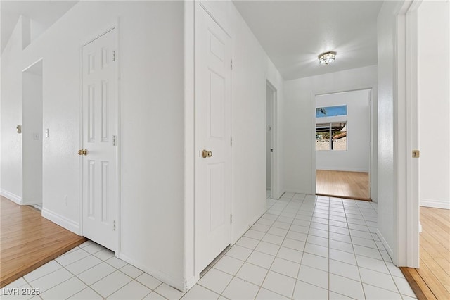 1908 Summit Pointe Dr, Las Vegas, NV 89117 - corridor featuring light tile patterned floors