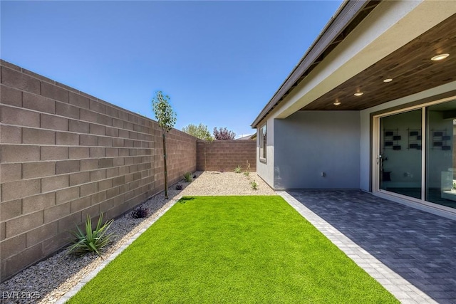 9617 Sard Ln, Las Vegas, NV 89143 - fenced backyard featuring a patio