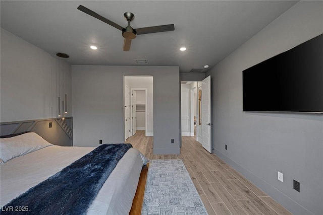 9617 Sard Ln, Las Vegas, NV 89143 - bedroom with light wood finished floors, recessed lighting, and a ceiling fan