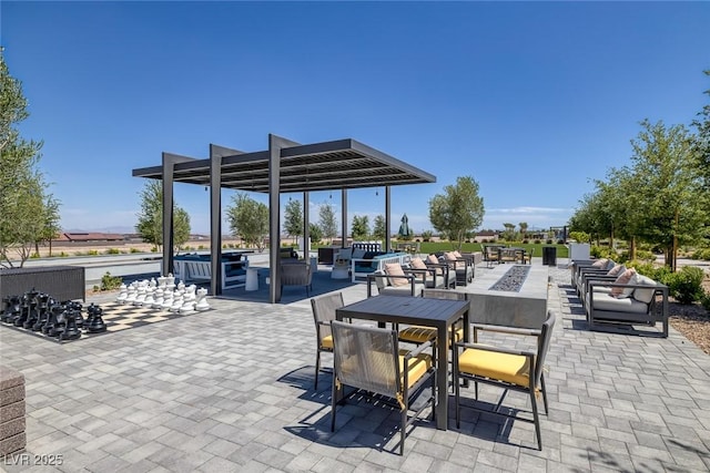 9617 Sard Ln, Las Vegas, NV 89143 - view of patio with an outdoor living space with a fire pit