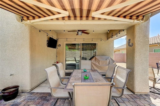 3307 Forestina Ct, Las Vegas, NV 89122 - view of patio featuring a ceiling fan, area for grilling, and outdoor dining area