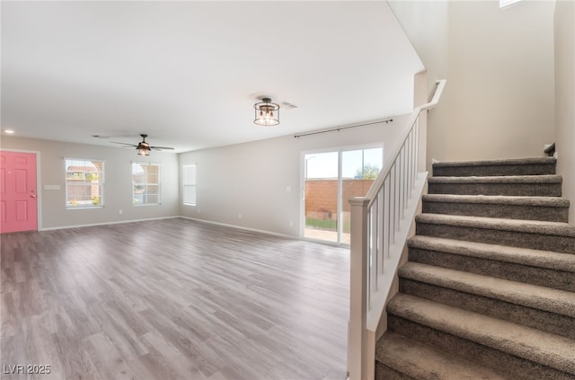 1102 E Dorrell Ln, North Las Vegas, NV 89086 - stairs with ceiling fan and wood finished floors