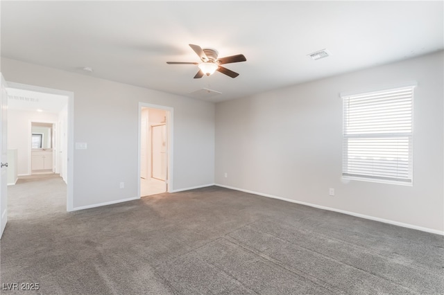 1102 E Dorrell Ln, North Las Vegas, NV 89086 - carpeted empty room featuring ceiling fan and baseboards