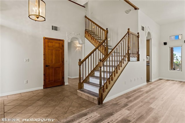 920 Vista Del Sol Ct, Mesquite, NV 89027 - stairway with a towering ceiling and arched walkways