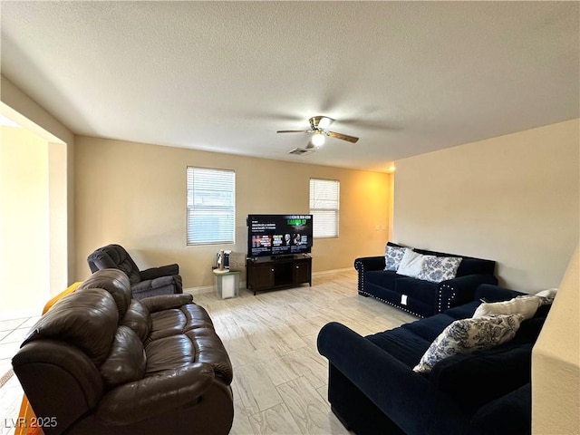 9148 Patrick Henry Ave, Las Vegas, NV 89149 - living area with ceiling fan and a textured ceiling