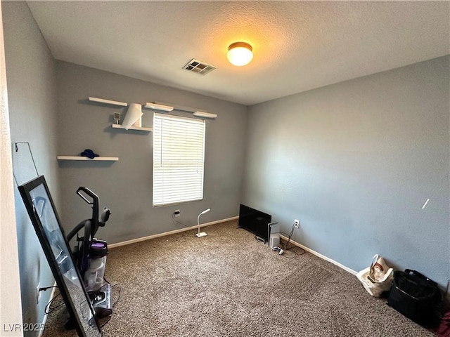 9148 Patrick Henry Ave, Las Vegas, NV 89149 - unfurnished office featuring carpet floors and a textured ceiling