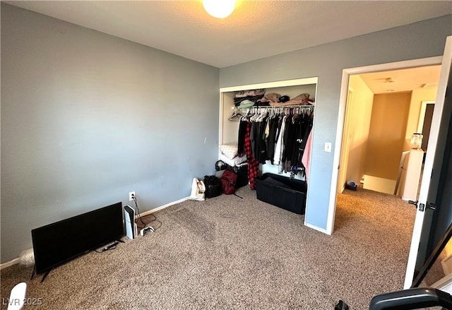 9148 Patrick Henry Ave, Las Vegas, NV 89149 - carpeted bedroom featuring a closet and baseboards