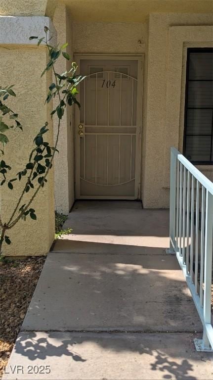 4877 S Torrey Pines Dr Unit 104, Las Vegas, NV 89103 - property entrance featuring stucco siding