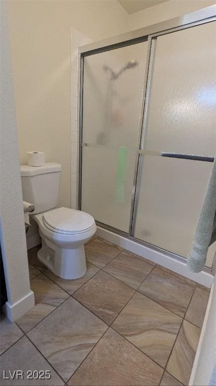 4877 S Torrey Pines Dr Unit 104, Las Vegas, NV 89103 - full bathroom featuring a shower stall and tile patterned flooring