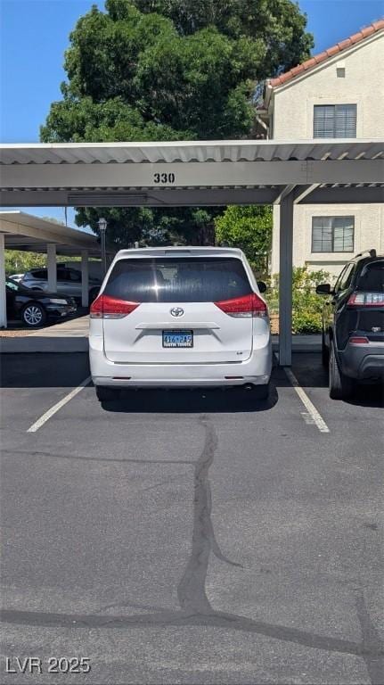 4877 S Torrey Pines Dr Unit 104, Las Vegas, NV 89103 - view of covered parking lot