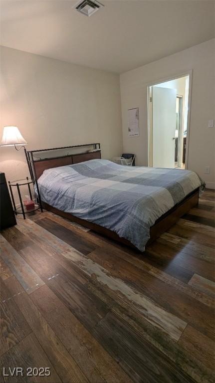 4877 S Torrey Pines Dr Unit 104, Las Vegas, NV 89103 - bedroom featuring wood-type flooring