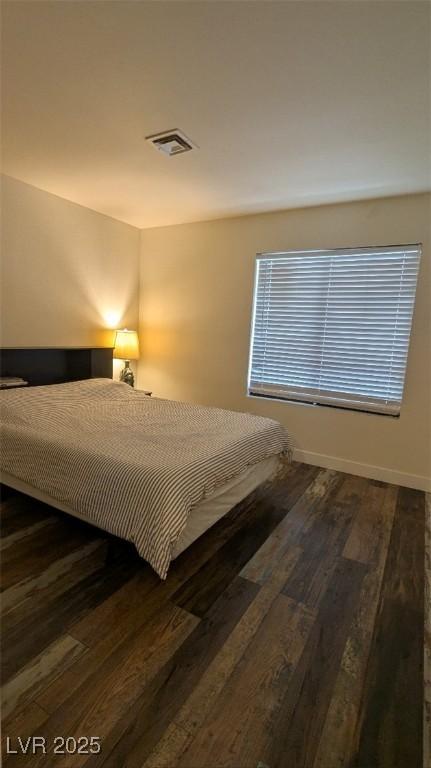4877 S Torrey Pines Dr Unit 104, Las Vegas, NV 89103 - bedroom with wood finished floors