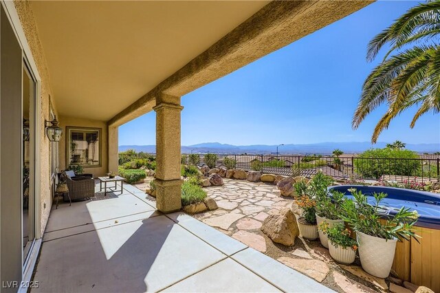 1637 Wellington Springs Ave, Henderson, NV 89052 - view of patio / terrace featuring a mountain view