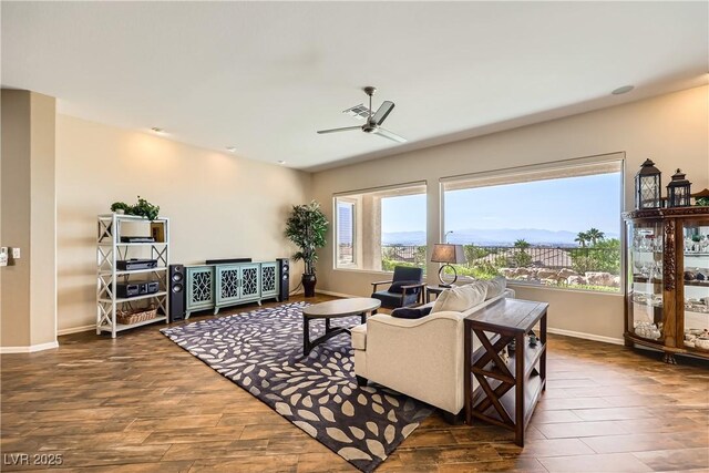 1637 Wellington Springs Ave, Henderson, NV 89052 - living area featuring a ceiling fan and wood finished floors