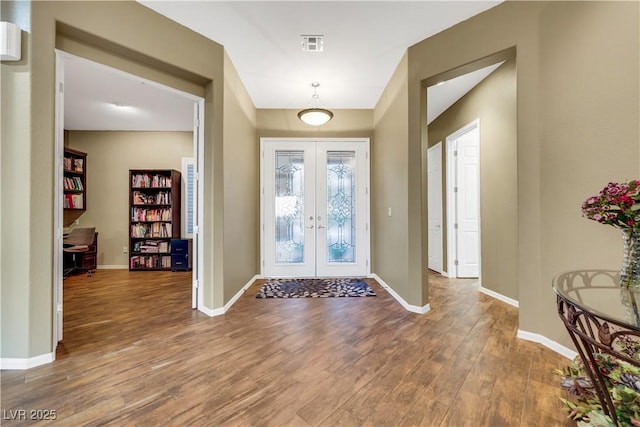 1637 Wellington Springs Ave, Henderson, NV 89052 - entryway featuring french doors and wood finished floors