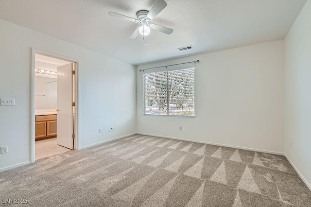 1547 Balsam Mist Ave, Las Vegas, NV 89183 - spare room with light colored carpet and a ceiling fan