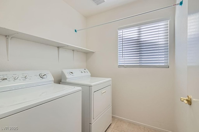 1547 Balsam Mist Ave, Las Vegas, NV 89183 - washroom featuring washer and clothes dryer and light tile patterned floors