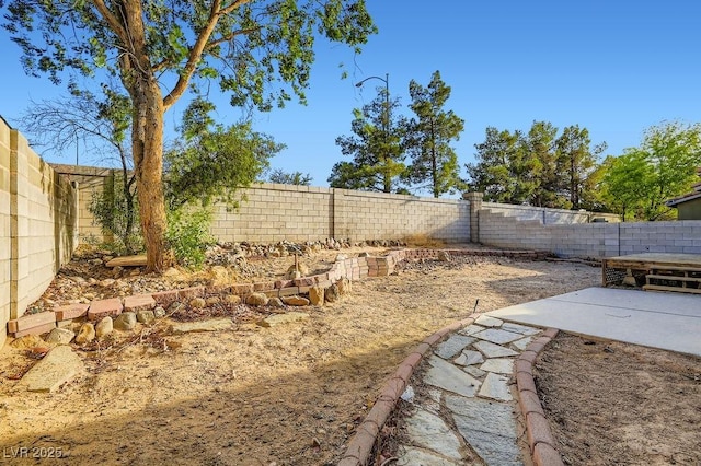 1547 Balsam Mist Ave, Las Vegas, NV 89183 - fenced backyard with a patio